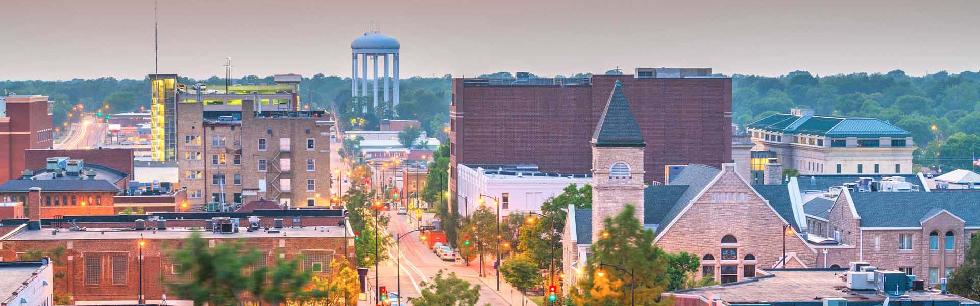 Neon color image of a band playing and people singing along